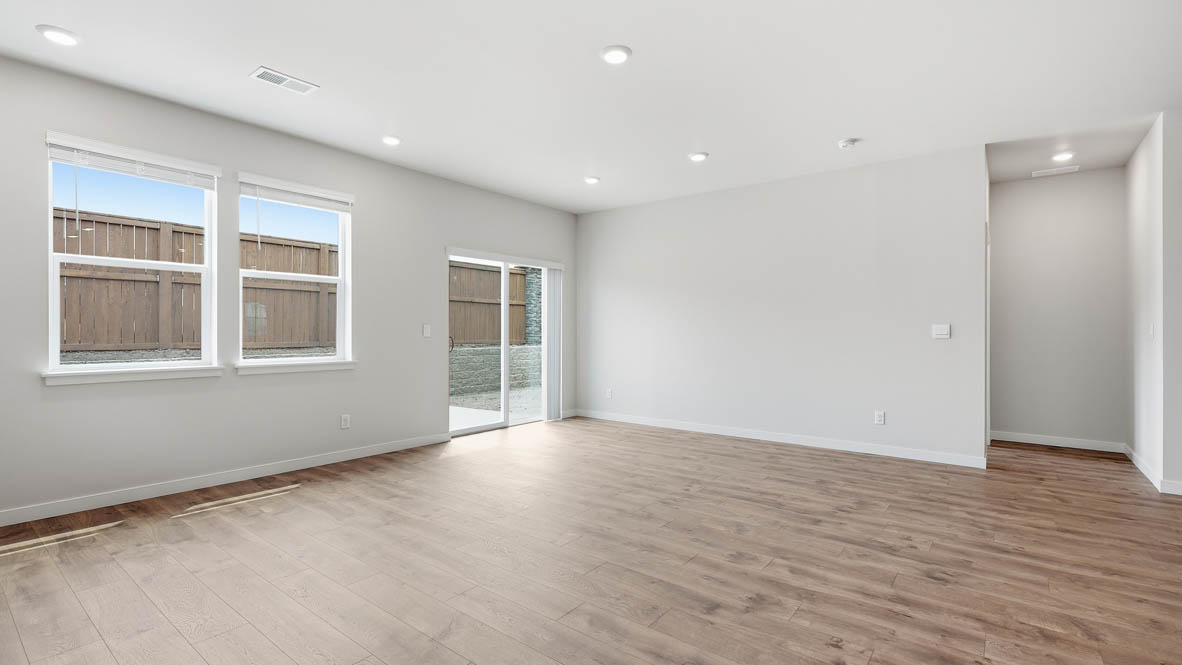 Stevens Ranch dining room with laminate flooring and window