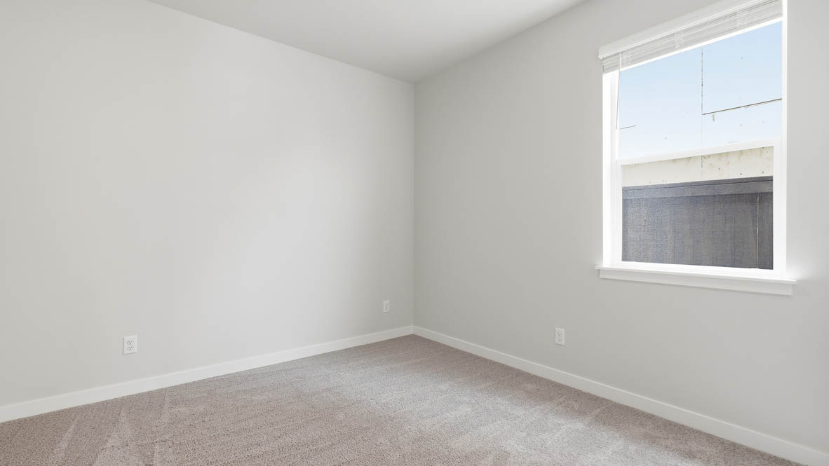 Stevens Ranch bedroom with carpet and window