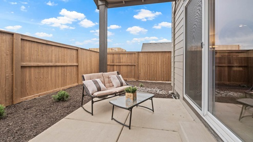 Stevens Ranch Backyard with outdoor furniture and pavement