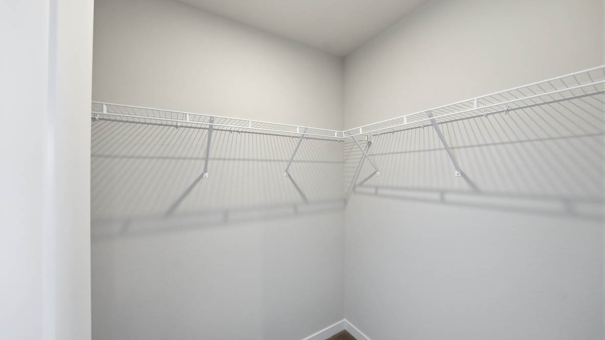 Stevens Ranch walk in closet with white wire shelving