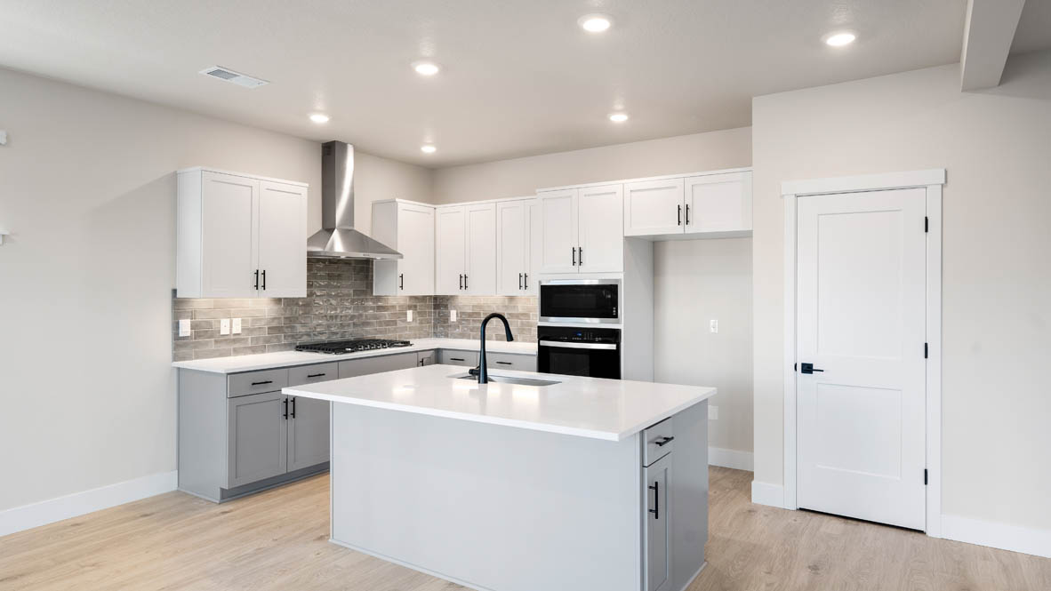 Stevens Ranch kitchen with stainless steel appliances, island, pantry, island