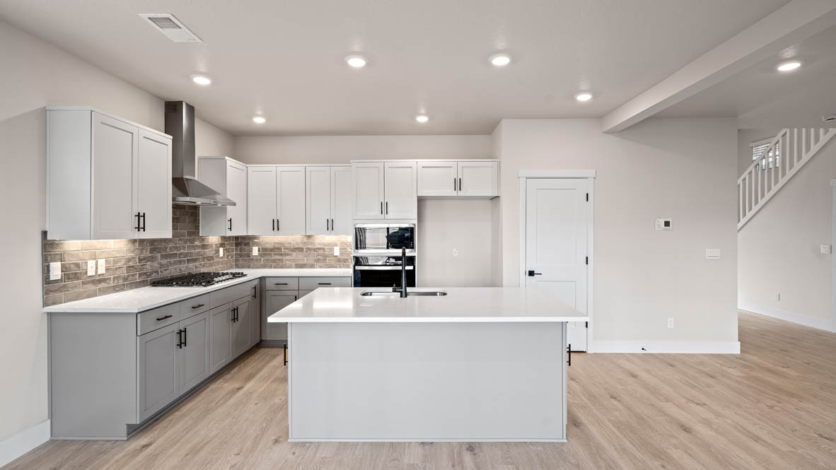 Stevens Ranch kitchen with stainless steel appliances, island, pantry, island