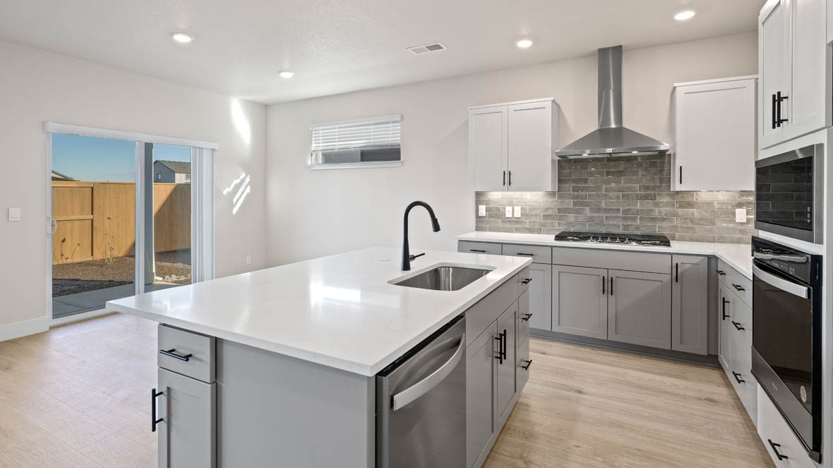 Stevens Ranch kitchen with stainless steel appliances, island, pantry, island