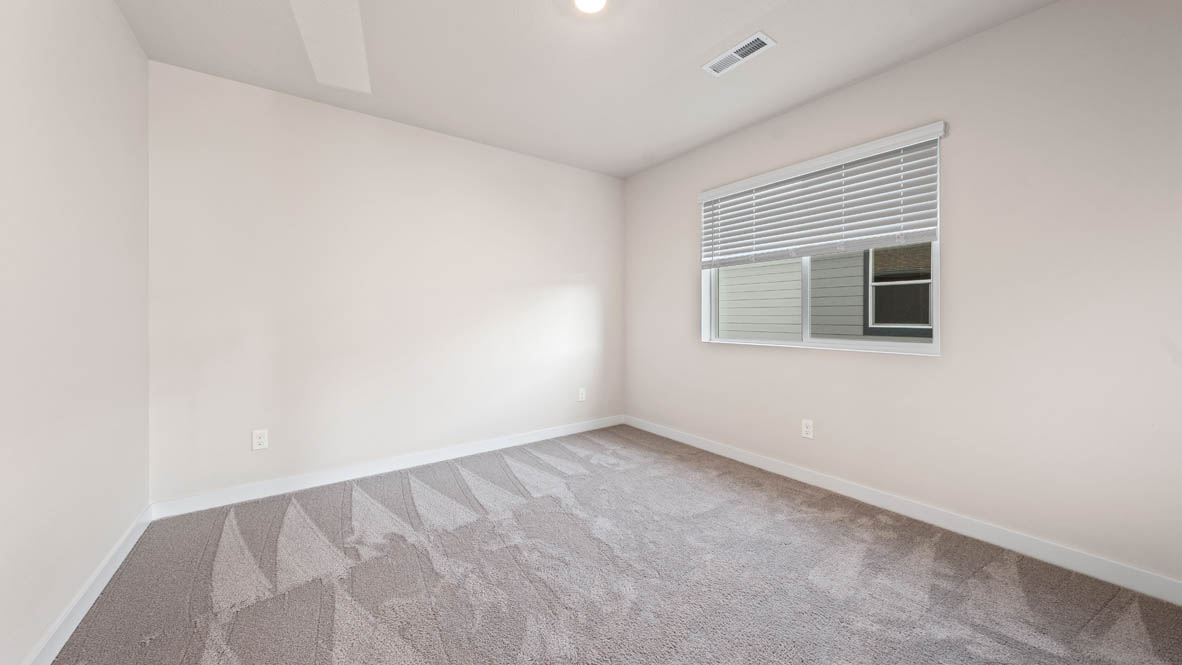 Stevens Ranch bedroom with carpet and a window