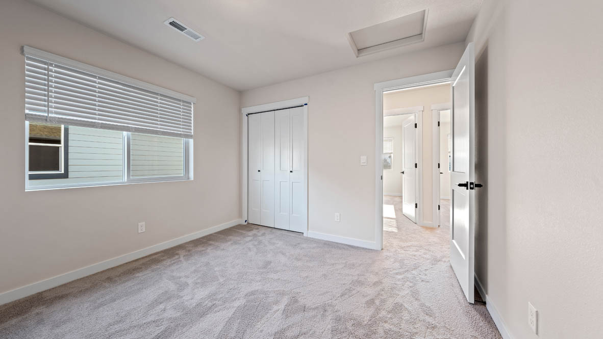 Stevens RanchStevens Ranch bedroom with carpet and a window