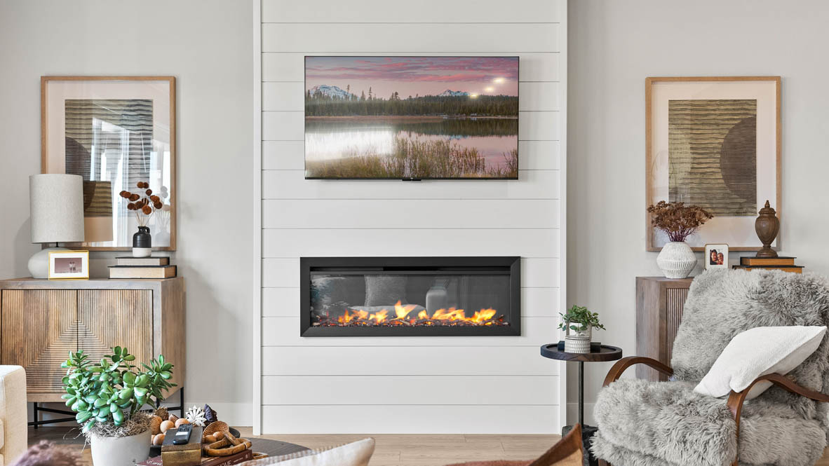 Stevens Ranch Diamond 3816 with hardwood flooring, fireplace, white accent wall, white couches, coffee table,