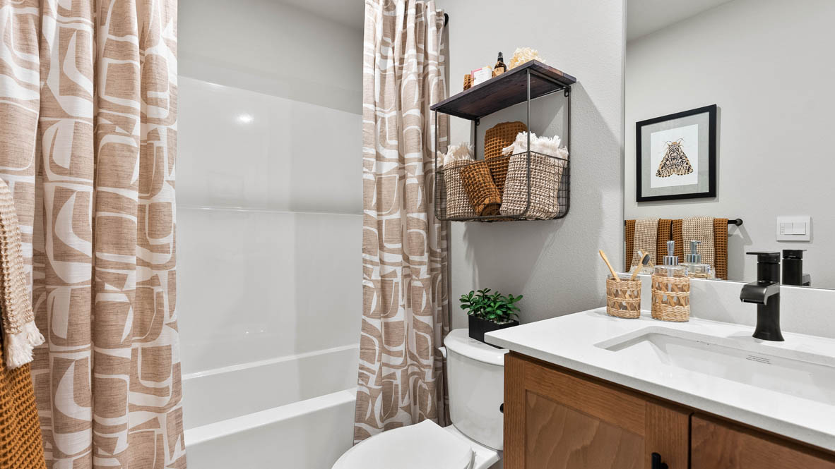 Stevens Ranch Diamond 3816 bathroom with a toilet and shower tub