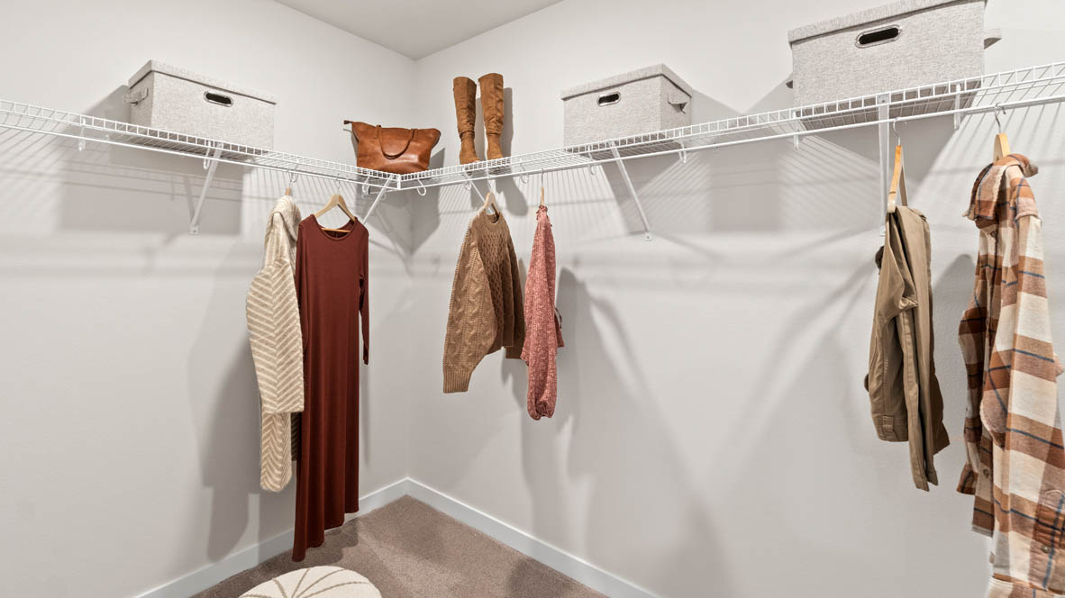 Stevens Ranch Walk in closet with white wire shelving