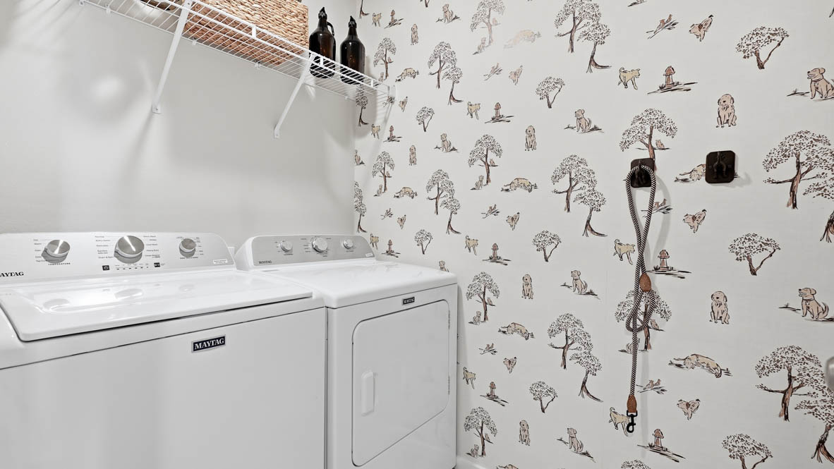 Stevens Ranch laundry room with white wire shelving