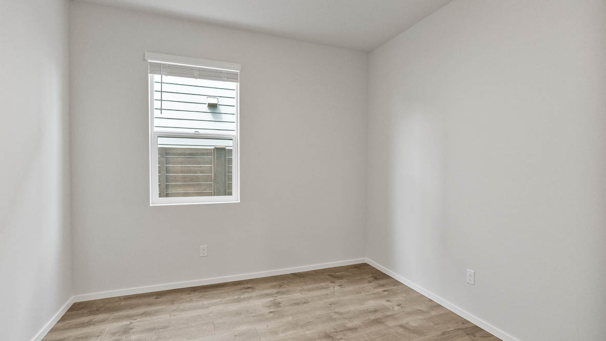 Monrovia den with carpet, and window