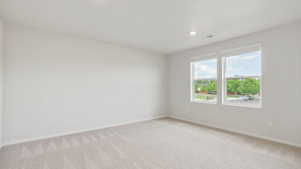 Monrovia Primary bedroom with window, carpet, and walls