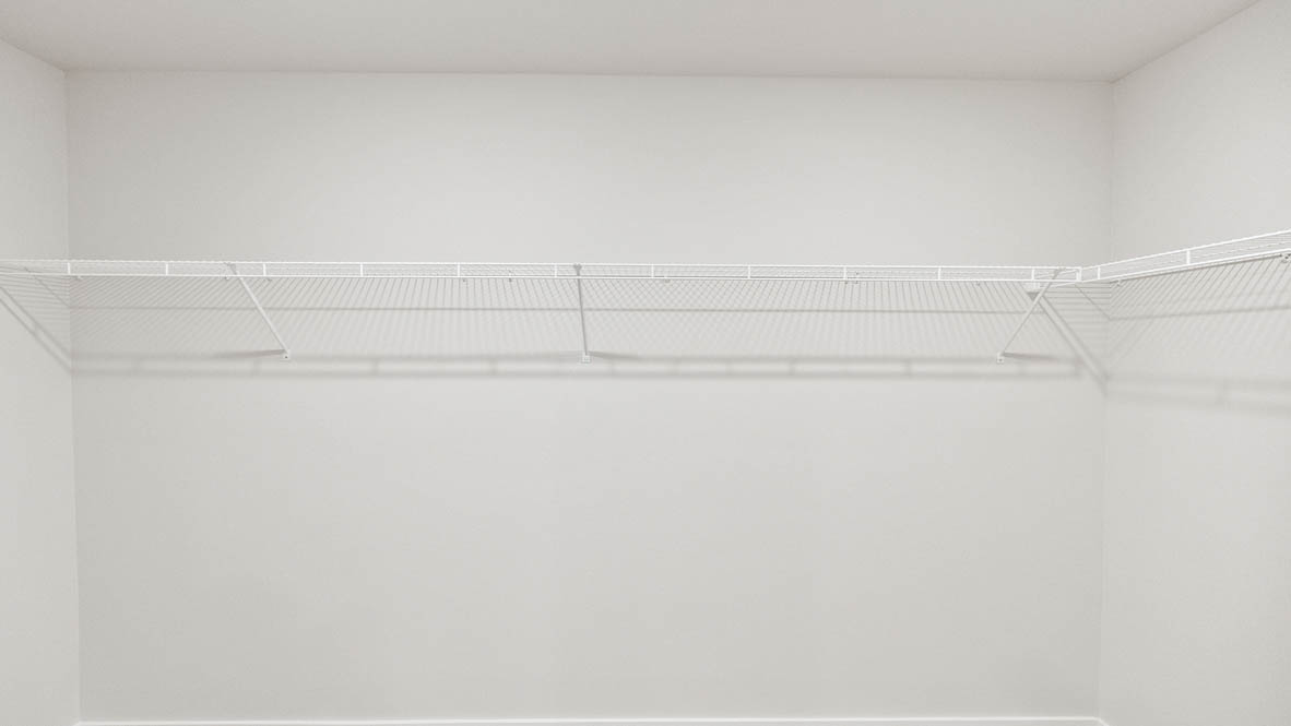 Monrovia walk in closet with white wire shelving and white walls