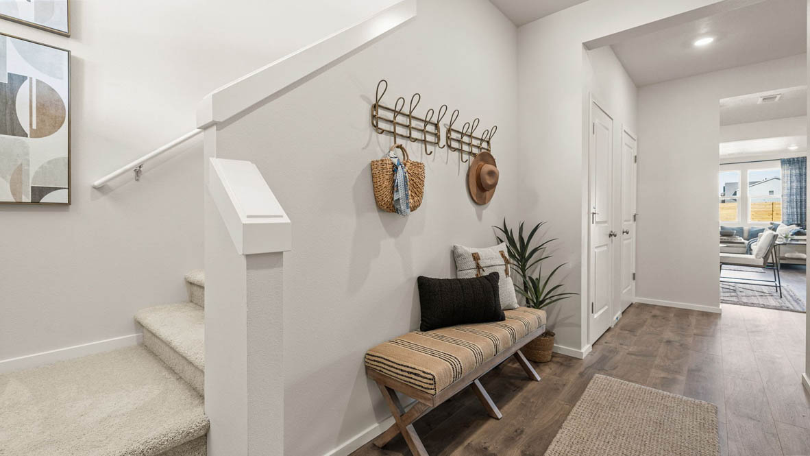 Monrovia Entry with bench and coat hooks on the wall