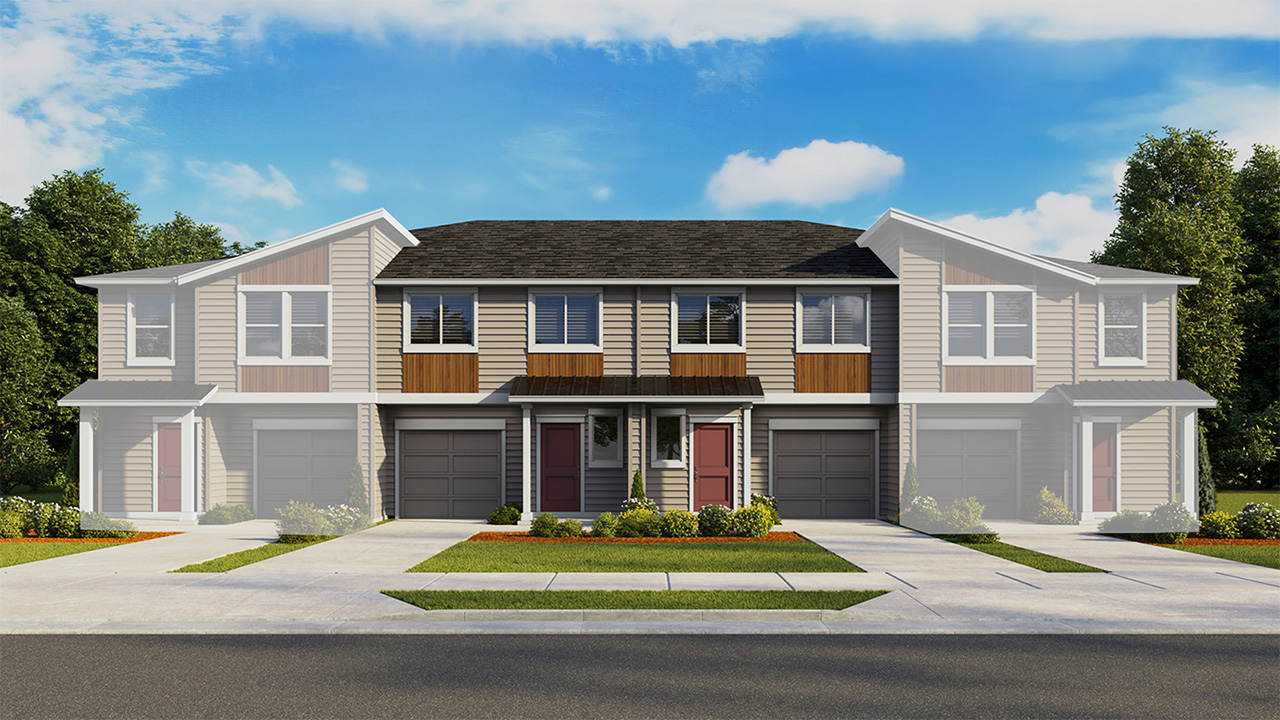 Exterior front townhome 4-plex with an attached garage