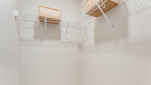 Scholls Meadow, walk in closet with white wire shelving