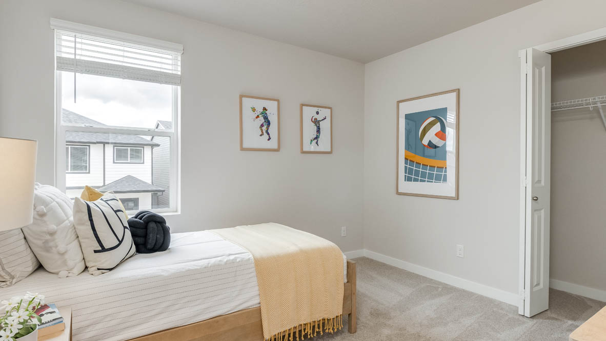 Davis Estates bedroom with carpet, windows, four paintings of the moon, telescope, and a dresser