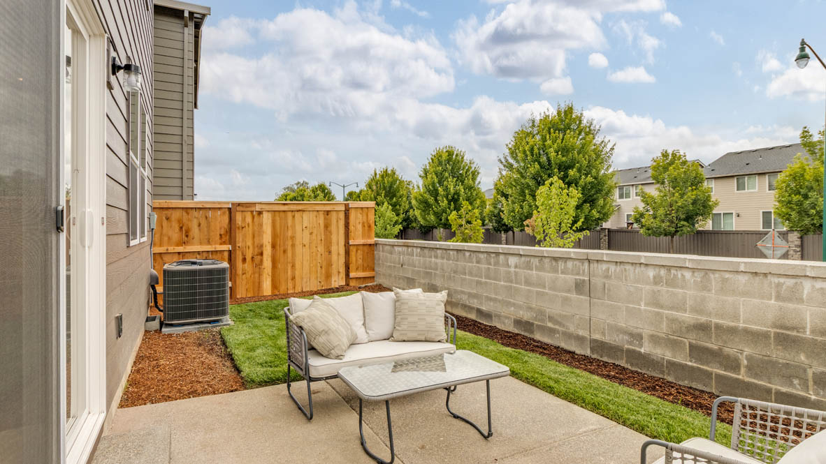 Davis Estates yard with chairs, and grass