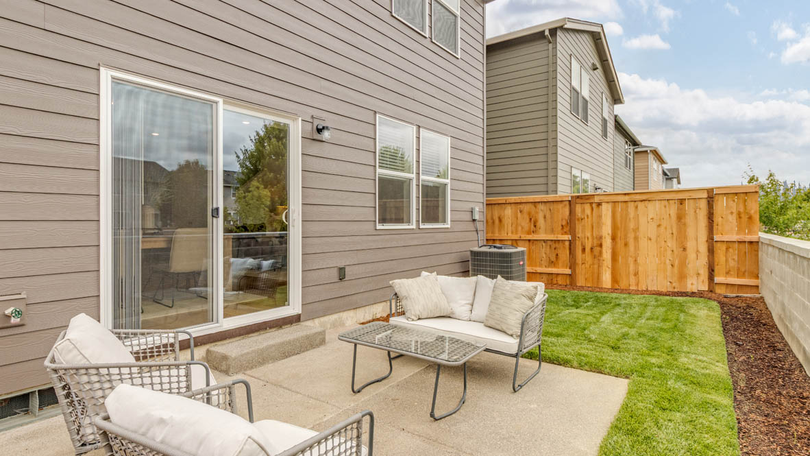 Davis Estates yard with chairs, and grass