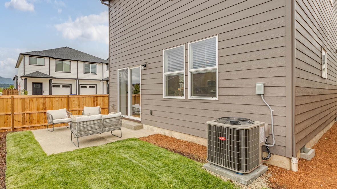 Davis Estates yard with chairs, and grass