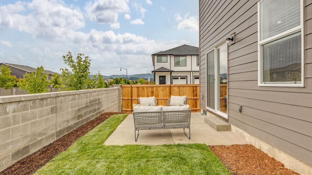Davis Estates yard with chairs, and grass