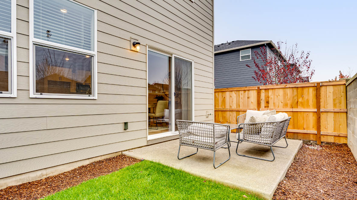 Davis Estates yard with chairs, and grass