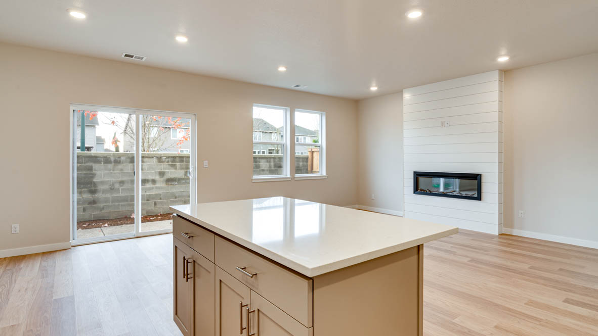 Davis Estates kitchen with shaker style cabinets and white quartz countertops