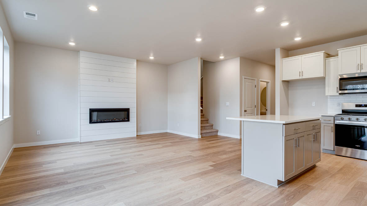 Davis Estates dining room and great room with fireplace