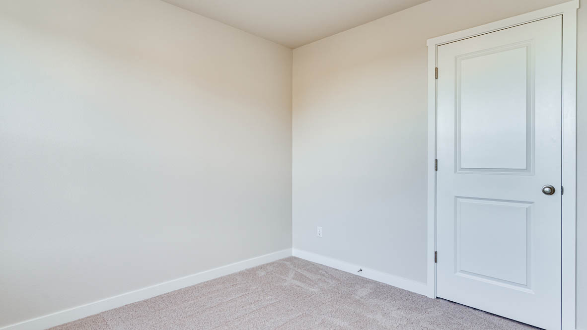 Davis Estates bedroom with carpeting and white walls and windows