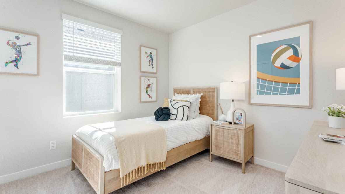 Davis Estates bedroom with a bed, nightstand, dresser, and window