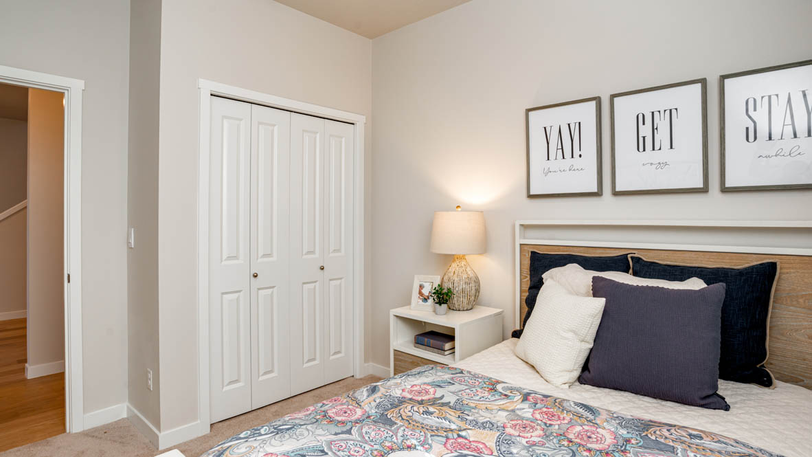 Davis Estates bedroom with carpet, window, and white walls