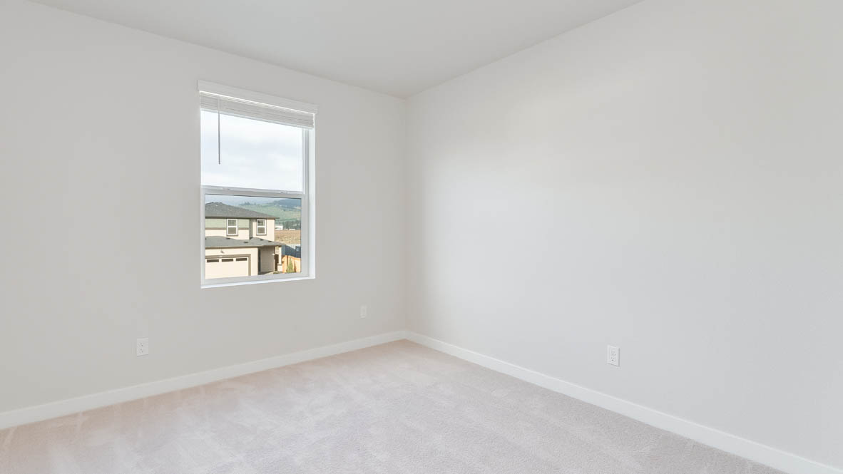 Davis Estates bedroom with carpet, and closet
