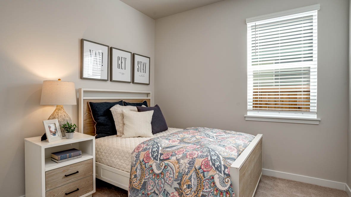 Davis Estates bedroom with carpet, window, and white walls