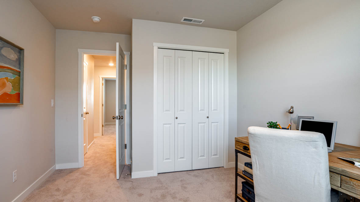 Davis Estates bedroom with carpet, and closet