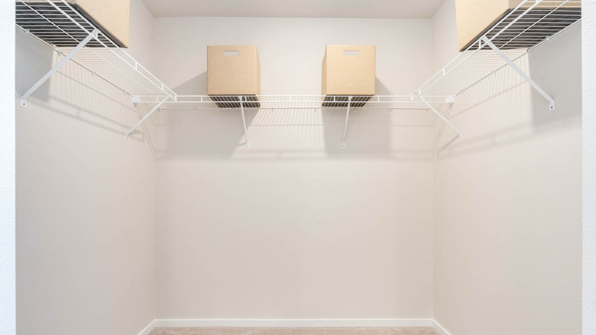 Marcola Meadows walk in closet with white wire shelving
