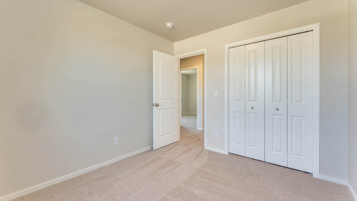 Marcola Meadows Bedroom with carpet and closet