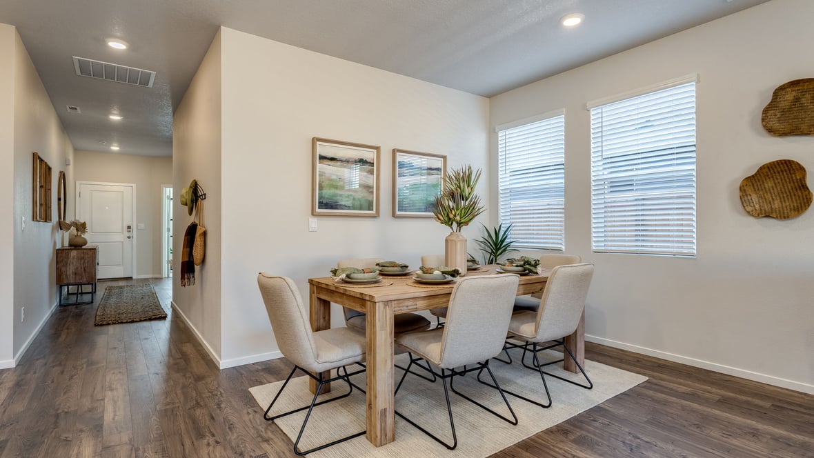 Marcola Meadows Cozy dining area with two windows next to it