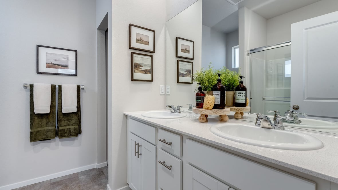 Marcola Meadows Bathroom that includes double sinks vanity with white cabinet and countertops