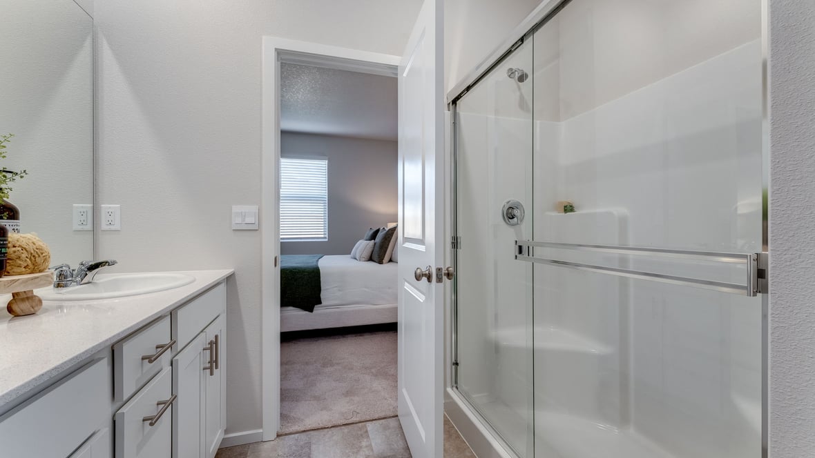 Marcola Meadows Bathroom that includes double sinks vanity with white cabinet and countertops