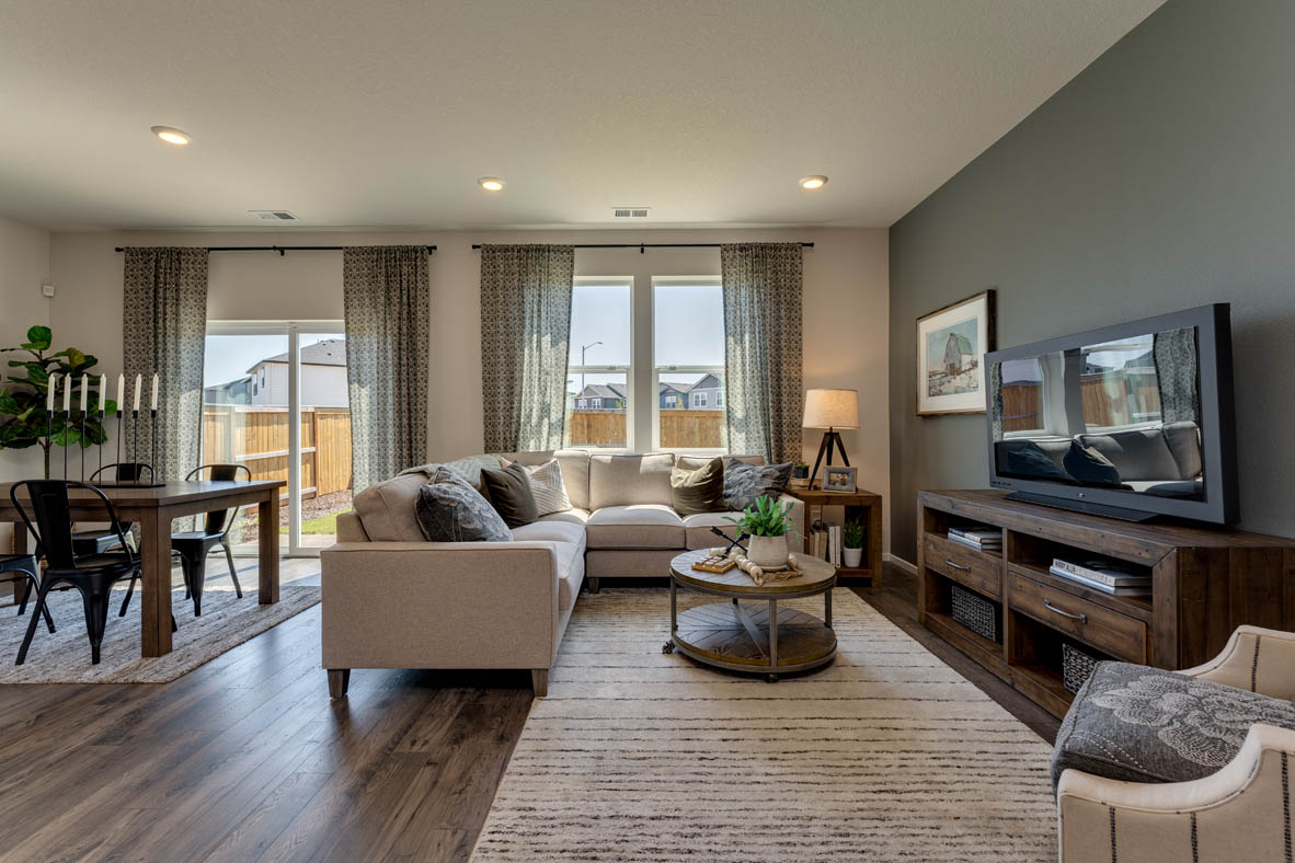Marcola Meadows Living room and dining room with two windows and patio door