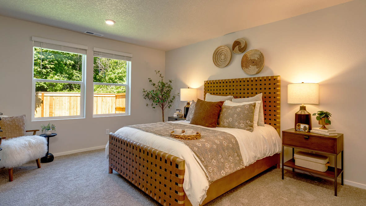 Eden Estates bedroom with carpet, window, and white walls