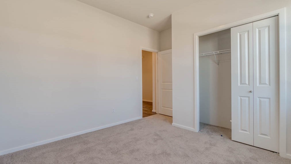 Eden Estates bedroom with a closet