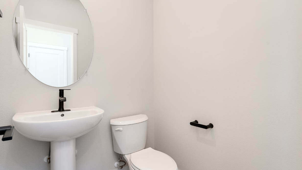 Sorrento Estates powder room with single pedestal sink