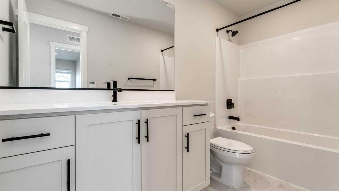 Sorrento Estates secondary bathroom with tub shower