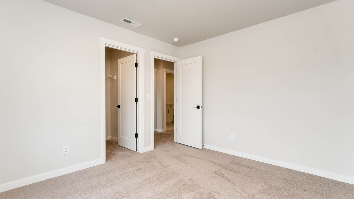 Sorrento Estates bedroom with walk in closet