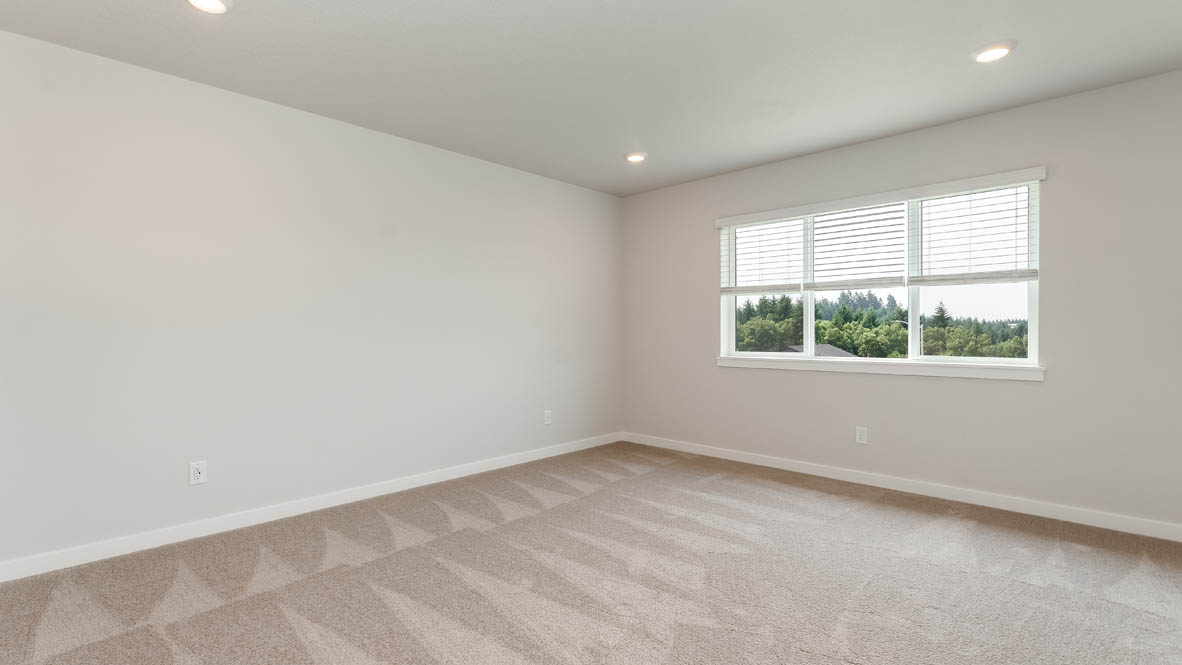 Sorrento Estates primary bedroom with en suite bathroom and walk in closet