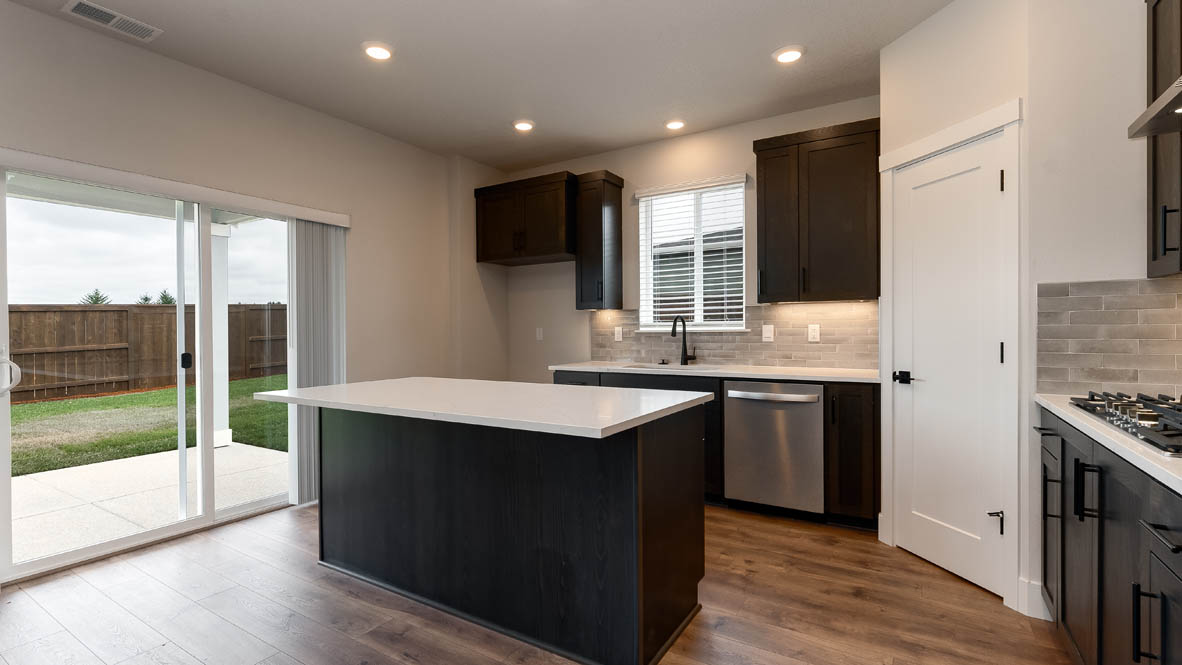 Sorrento Estates kitchen with stained shaker style cabinets