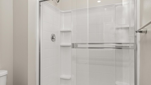 A bathroom with a shower.