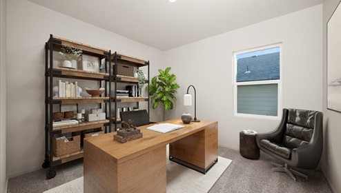An office room with a wooden desk and a large wooden bookshelf behind. There's an accent chair and a large window.