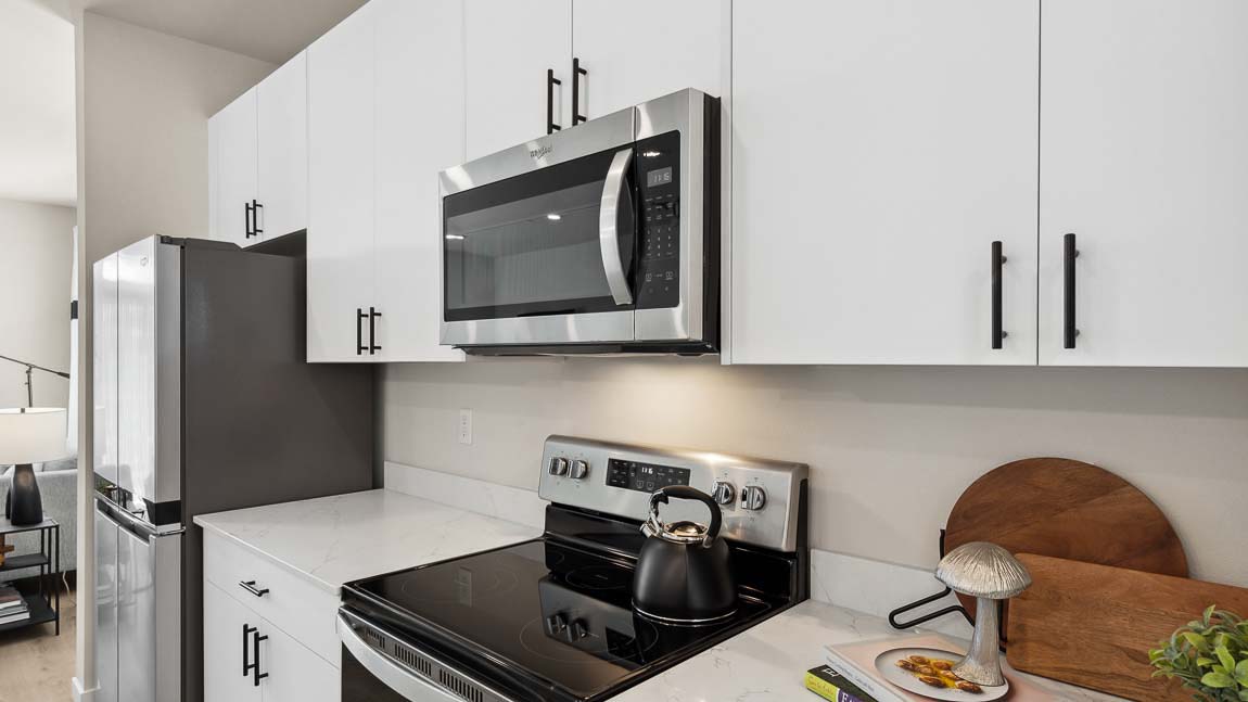Stainless steel appliances are featured in this model home kitchen at Cathcart Crossing