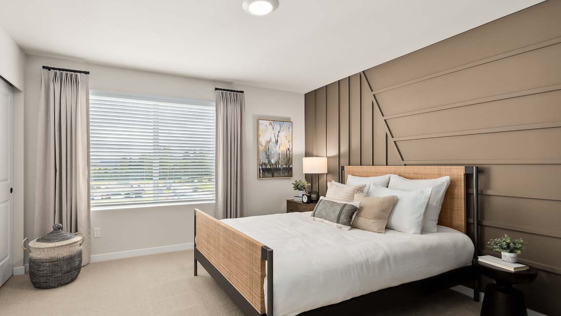 Bennett floor plan private bedroom suite which provides a large window and storage closet